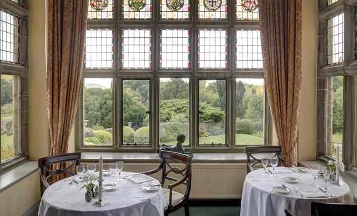 Dining Room Stain glass window overlooking the Formal Gardens.